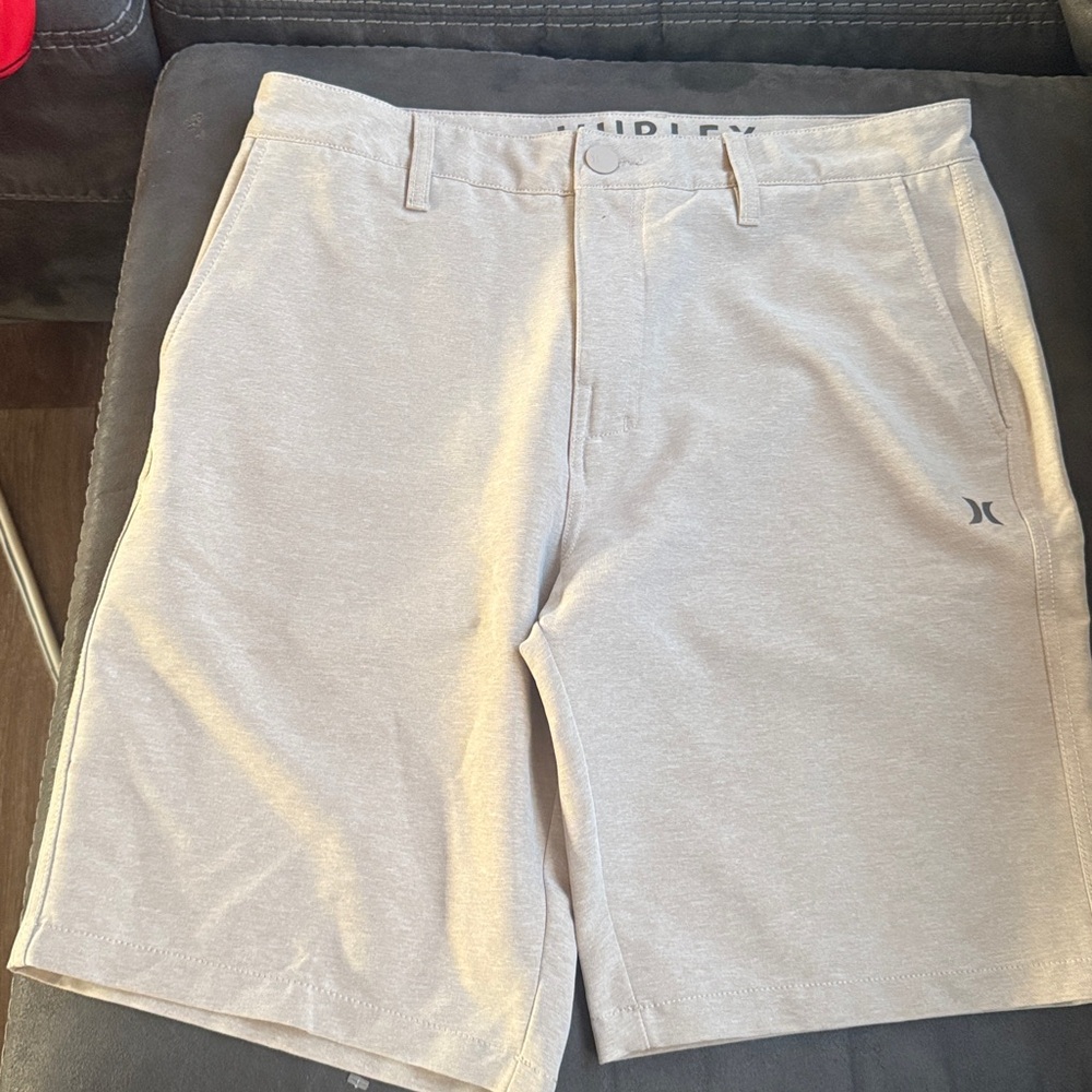 2 Shorts 
Hurley Men's light tan Flat Front Shorts And All in motion shorts